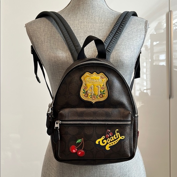 Coach Handbags - Coach Signature Charlie Backpack coated canvas and refined pebble leather F25909